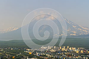 View of the city Petropavlovsk-Kamchatsky on background of volcanoes. Kamchatka, Russia