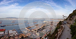 View of the City and Port from top of Rock of Gibraltar. Sunny Morning Sky. Gibraltar