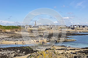 view of the city of Saint Malo from one of the islets at low tide, France