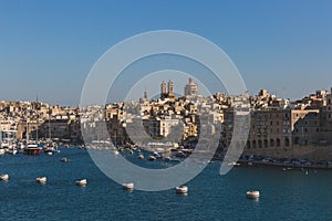 City of Senglea, Malta under blue sky, with Knisja Maria Bambina photo