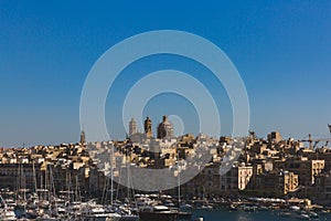 City of Senglea, Malta under blue sky, with Knisja Maria Bambina photo