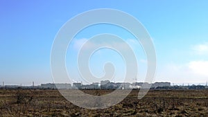 View of the city from the side of an empty field