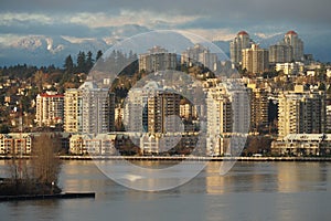 View on city skyline with buildings on the Vancouver, British Columbia, Canada from container terminal Fraser Surrey Docks.