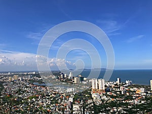 View of city from Small Mountain in summer, thriving metropolis beach, Vung Tau. Vietnam