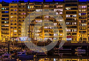 View on the city street and apartment buildings from the harbor, Blankenberge, Belgium, city architecture of a popular Belgian