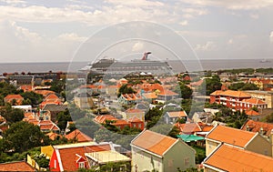 View of the city from the top of Queen Juliana Bridge and Carnival cruise ship on the bay in Willemstad, Curacao