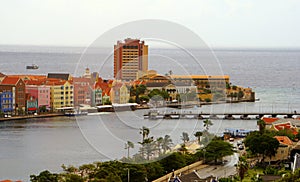 View of the city from the top of Queen Juliana Bridge, with colorful buildings along St Anna Bay near Willemstad, Curacao