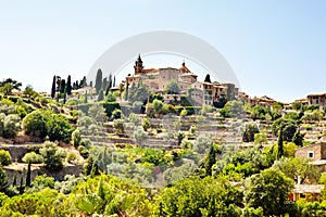 View on city Valldemossa with traditional flower decoration, famous old mediterranean village of Majorca. Balearic