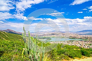 Cityscape of Cochabamba from Cerro de San Pedro hill photo