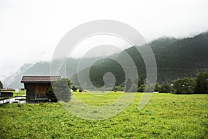 View cityscape and landscape of Pfunds city with grass field and mountain