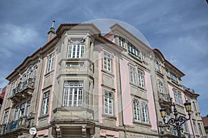 View at a classic traditional urban buildings on Viseu city Downtown, Portugal