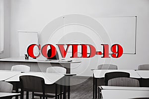 View of classroom and text COVID-19. School closings during coronavirus outbreak