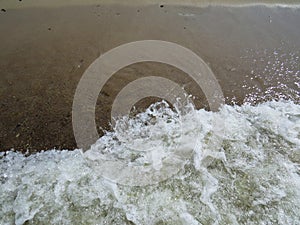 View at Clean Tranquil Water Surface Reflection with Small Waves