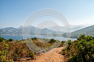 View of the clear sea and rocky hills in Corsica region Galeria