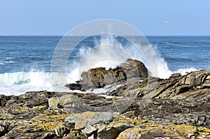 View from a cliff with waves splashing at famous Costa da Morte in Galicia Region. CoruÃ±a, Spain.