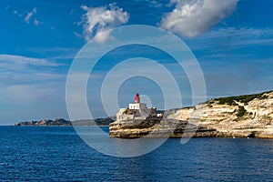 View of the cliffs of Bonifacio and the Madonetta lighthouse at the harbor entrance