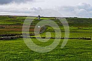 View at Cliffs of Moher with guard tower from Doolin, Ireland