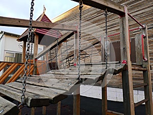 View of a climbing frame made of wood in the schoolyard