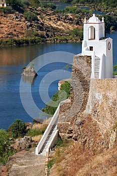 Clock tower Torre do Relogio on the right bank of Guadiana. Me photo