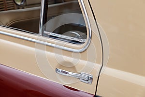 View on closed rear door with handle and corner wondow of the old Russian retro vintage car of the executive class released in the