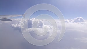 A view of clouds from airplane`s window.