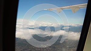 View of clouds from a airplane window.