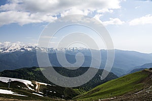 View of a cloudy valley in the Alps