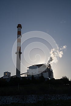 View of a coal power plant tower in Ventanas Town, Chile photo