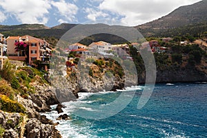 A view at the coast of Asos village, Assos peninsula and fantastic turquoise and blue Ionian Sea water. Summer scenery