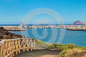 View of the coast and marina of Los Abrigos photo