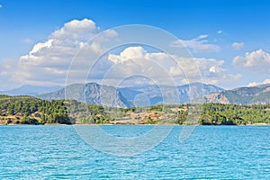 View of the coast and the mountains from the water side