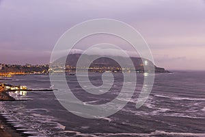 View of the coast of the Pacific in Miraflores (Lima Peru) at nightfall