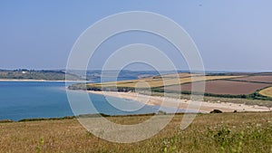 View of the coastline from Hawkers Cove to Rock in Cornwall photo