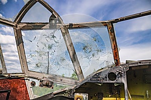 View from the cockpit of old ruined aircraft Antonov An-2 at abandoned Airbase aircraft cemetry in Vovchansk, Kharkov region,