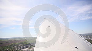 View from the cockpit to the wing of the aircraft, flight in the air