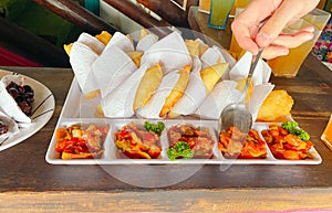 View of Colombian empanadas with side dish