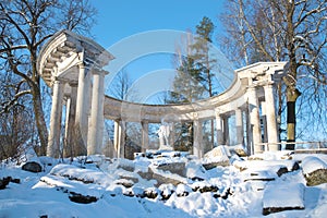 View of the colonnade of Apollo in Pavlovsk palace park on a sunny February day. Saint Petersburg