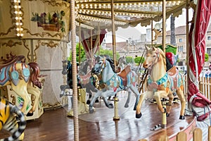 View of colorful horses from a vintage classic carousel