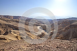 View of the colorful mountains and valley of Eilat Red Canyon against the blue sky