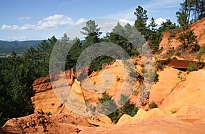 View of colorful orange ochre cliffs at the natural regional park in Roussillon, Vaucluse, Luberon, photo