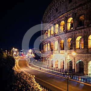 View of the Colosseum by night in Rome, Italy
