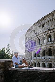 View of Colosseum in Rome and morning sun, Italy, Europe