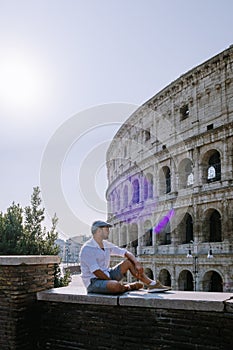 View of Colosseum in Rome and morning sun, Italy, Europe