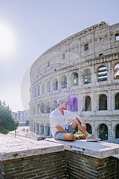 View of Colosseum in Rome and morning sun, Italy, Europe