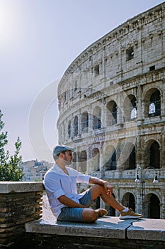 View of Colosseum in Rome and morning sun, Italy, Europe