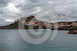 view of the colourful hillside town of Castelsardo in northern Sardinia