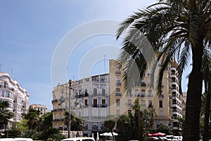 View of colourful townhouse buildings on the Avenida del Ragne de Valancia in Eixample, Valencia, Spain