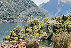 View of the Comacina Island with Saint Giovanni church on lake Como, Ossuccio, Italy