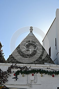 View of the conical roof of the trulli houses in Alberobello, Apulia - Italy