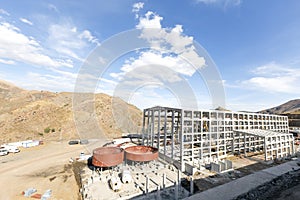 View of the construction site for flotation chemical plant. Froth flotation is a process for selectively separating hydrophobic.